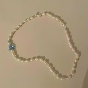 Adorable blue teddy seashell necklace